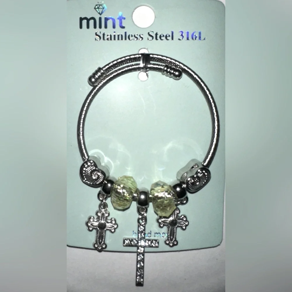 Mint Stainlees Steal Charm Bracelet with Divinity Cross, Hearts and Beads.